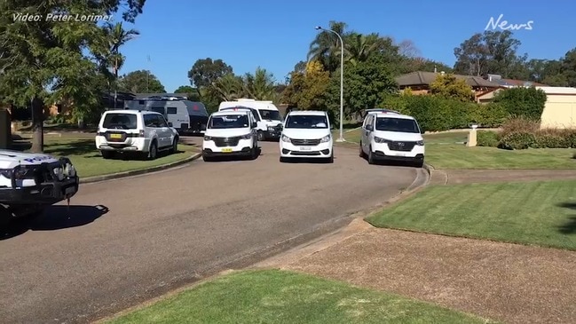 Police at the scene of a murder in Metford, Maitland