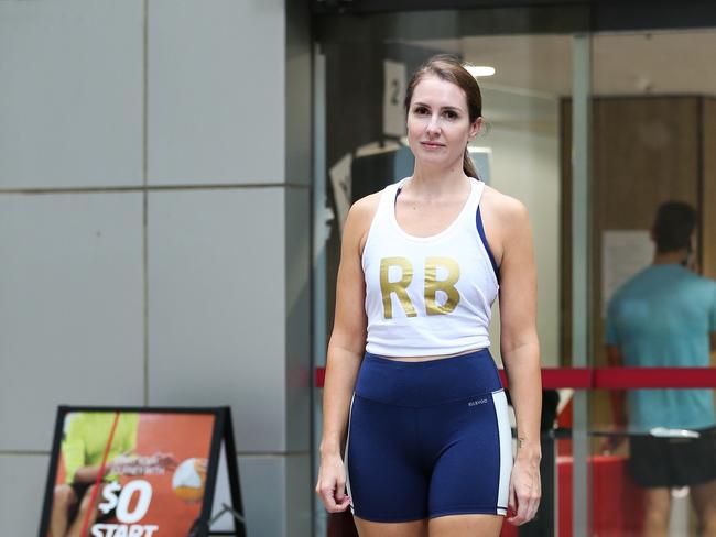 Chloe Drumgold will continue to train at Fitness First in the CBD despite the confirmed coronavirus case. Picture: Gaye Gerard