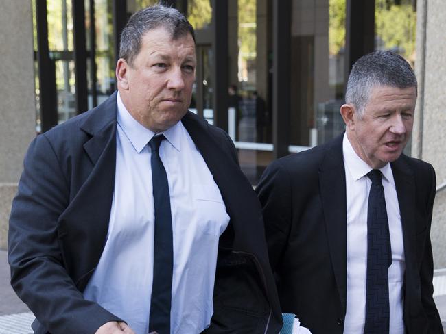 NRL Agent Accreditation Officer Paul Massey (left) leaves the Supreme Court in Sydney on Wednesday. Picture: Dylan Robinson