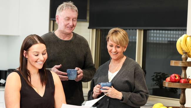 Bethany Schenscher with her parents Julie and Peter. Picture: Russell Millard