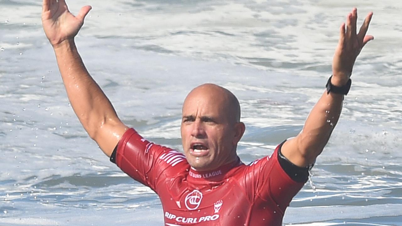 Surfer Kelly Slater caught in a rip. AAP Image/James Ross.