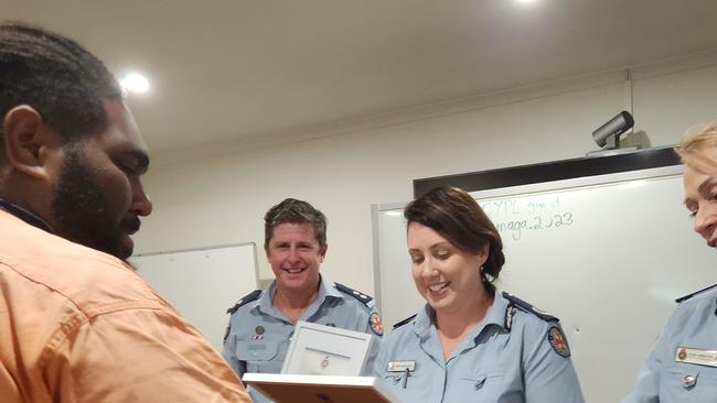 Senior Ranger Frankie Cook receives a certificate of appreciation from QAS Far Northern Region Assistant Commissioner Brina Keating. Picture: NPARC