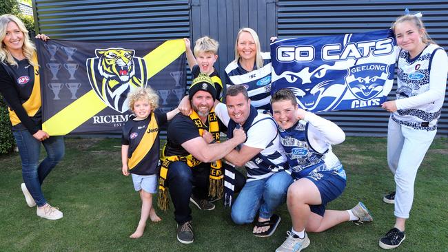 Tigers family Marcus and Kasia Holt with their children Frankie 4yrs and Ari 9yrs with the Cats family Jono and Jules Holt and their children Mack 12yrs and Milli 14yrs. picture: Glenn Ferguson