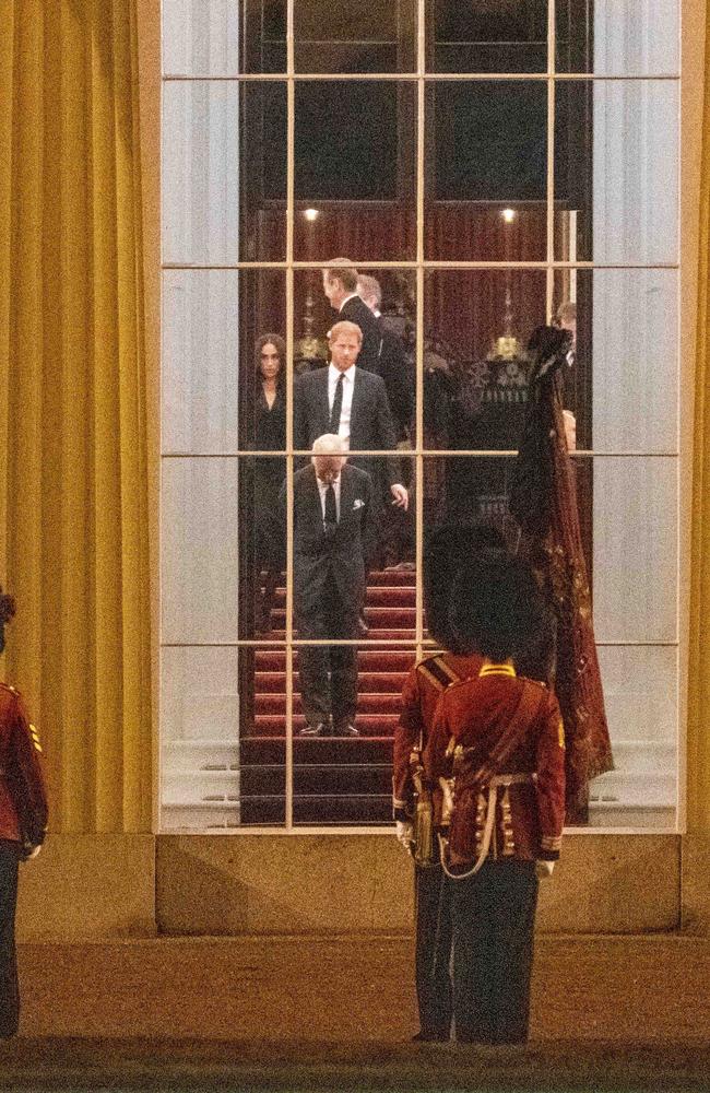 Meghan Markle, Prince Harry and Prince Charles were seen at Buckingham Palace. Picture: Jeremy Selwyn/Wpa Pool/REX/Shutterstock