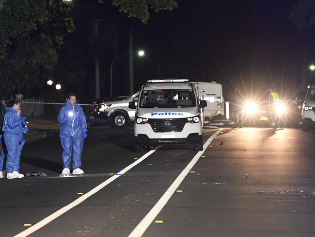 Ingleburn Fatal Assault at Party: One man is dead and four others under arrest after an out of control party spilled over into Chester Road Ingleburn just before 10pm. One man is believed to have gone into cardiac arrest prior to reaching the hospital and has since passed away. I photographed a young man being arrested in nearby Jaclyn Street which runs parallel to Chester Road. He was searched, spoken to and taken away at around 11:30pm. It's unclear at this stage if his arrest is directly related to the previous fatal assault. Police (mainly PORS Police) were doorknocking people's houses late into the night, I assume to find any witnesses. Police setup a large crime scene on Chester Road near the Ingleburn RSL blocking the road in both directions. Glass and other debris could be seen strewn across the road. Investigations into the incident are continuing. Picture: Gordon McComiskie