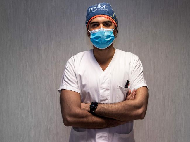 Italian intern Alessio Cecili poses during a photo session at the Intensive Care Unit of the Tor Vergata Covid-4 hospital in Rome. italy’s lockdown could be extended. Picture: AFP