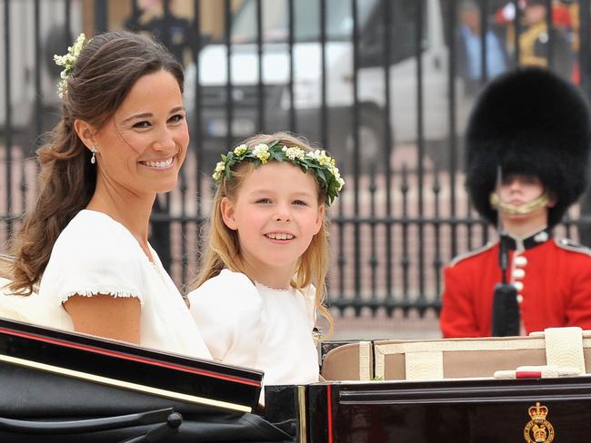 Pippa Middleton makes her journey by carriage procession to Buckingham Palace with Margarita Armstrong-Jones after the royal wedding. Picture: Getty