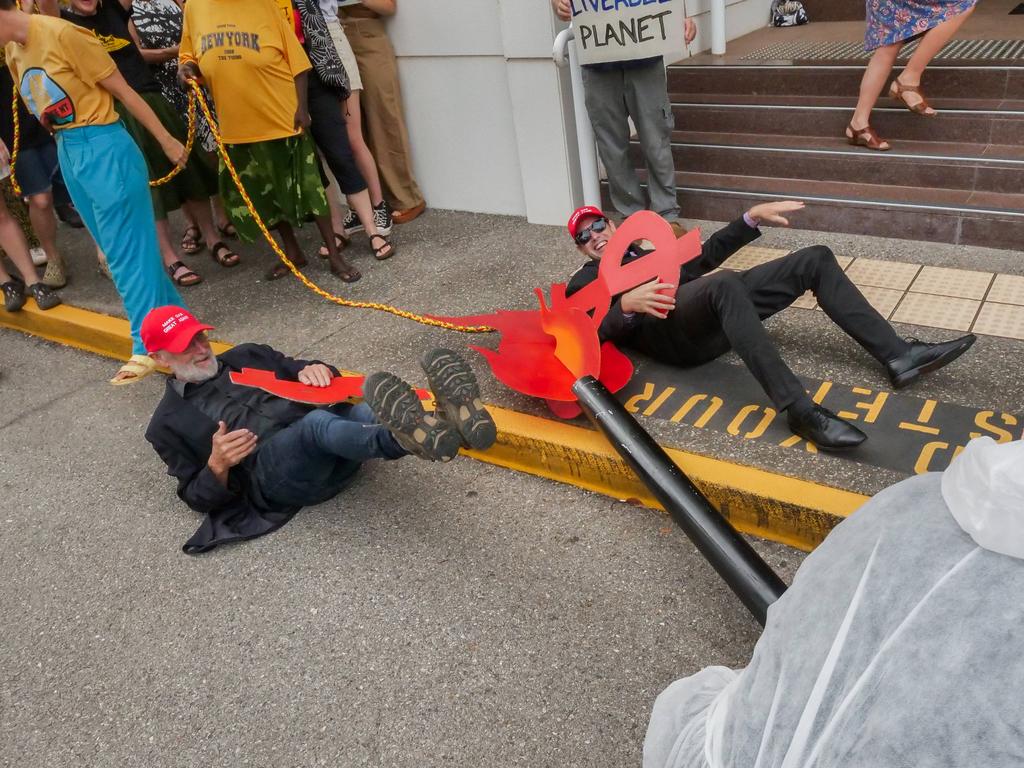 Anti-fracking activists dressed as gas executives lost dramatically to a crowd of “people-power” in a game of tug of war. Picture: Pema Tamang Pakhrin