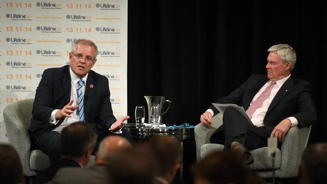 Prime Minister Scott Morrison speaks as Mike Munro hosts a Q&amp;A at the Lifeline Australia Luncheon in Sydney last week Picture: AAP Image/Joel Carrett