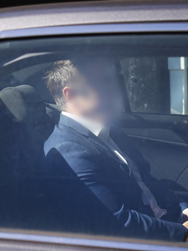 Ben McCormack is driven away by police today. Picture: NSW Police