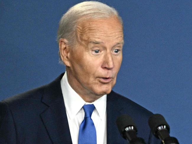 TOPSHOT - US President Joe Biden corrects himself after accidentally introducing  Ukraine's President Volodymyr Zelensky (R) as Russia's President Vladimir Putin during the Ukraine Compact initiative on the sidelines of the NATO Summit at the Walter E. Washington Convention Center in Washington, DC, on July 11, 2024. (Photo by Brendan SMIALOWSKI / AFP)