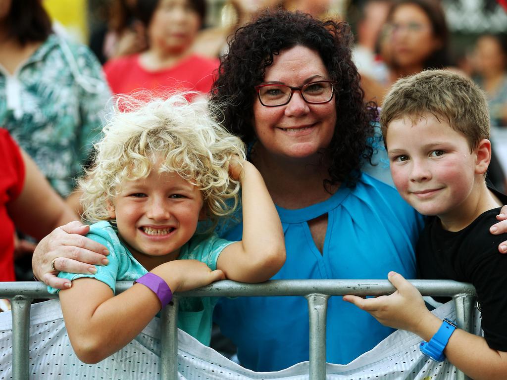 Sasha Edney, 6, Margaret Marsten and Will Marsten, 8, at the Cairns and District Chinese Association Inc Chinese New Year street festival on Grafton Street. PICTURE: BRENDAN RADKE