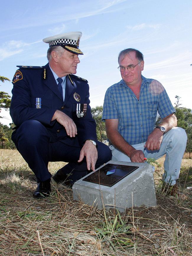 The then Commissioner of Police, Richard McCreadie, left, with Colin Lisson at the unveiling of Private Victor Lisson’s new plaque on the Soldiers’ Memorial Avenue in 2006. Picture: JAMES KERR