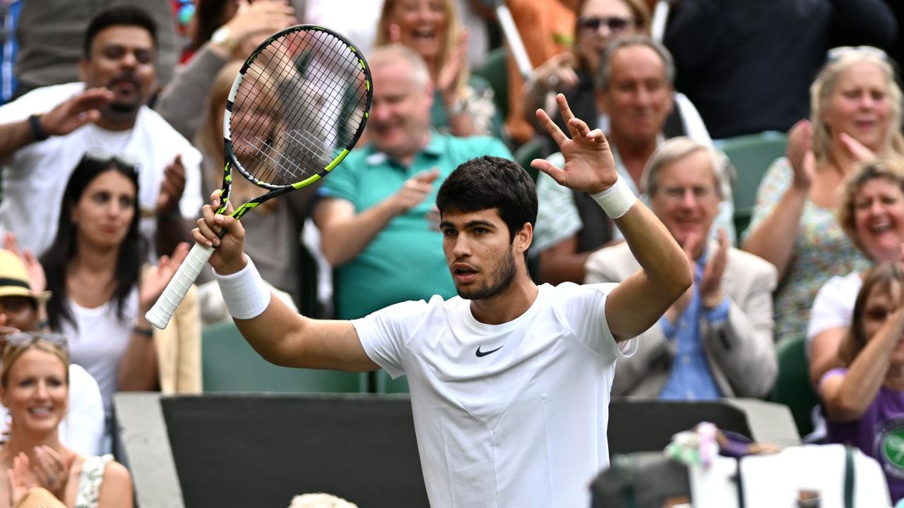 Carlos Alcaraz is into the Wimbledon quarterfinals for the first time. (Photo by Mike Hewitt/Getty Images)