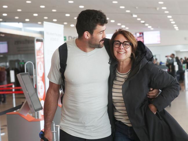 Rob Wilkinson with his mum Ann Paton at Hobart Airport. Rob arrives back in Hobart after winning the Professional Fighters League light heavyweight championship in New York. Picture: Nikki Davis-Jones