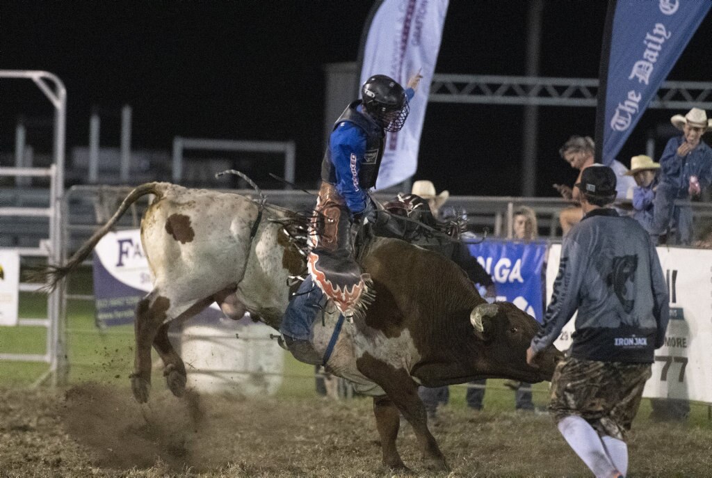 Jack Watt rides in the open bullride at the Lawrence Twilight Rodeo. Picture: Adam Hourigan