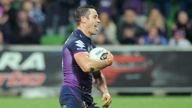 Cooper Cronk celebrates his try for the Storm.