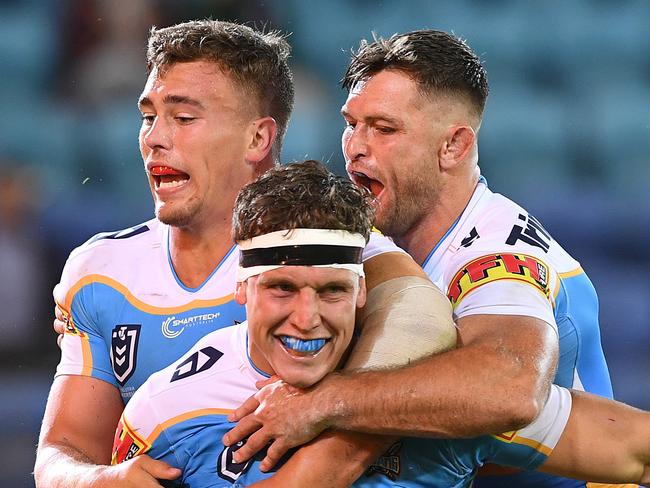 Jarrod Wallace  of the Titans reacts after scoring a try during the Round 5 NRL match between the Gold Coast Titans and the Penrith Panthers at CBUS Stadium on the Gold Coast, Friday, April 12, 2019. (AAP Image/Dave Hunt) NO ARCHIVING, EDITORIAL USE ONLY