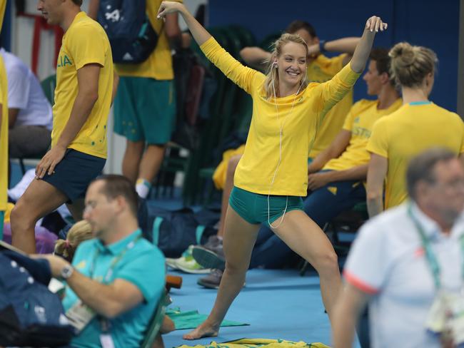 Maddie Wilson stretches ahead of a swim at Olympic Park Rio de Janeiro. Picture: Alex Coppel.