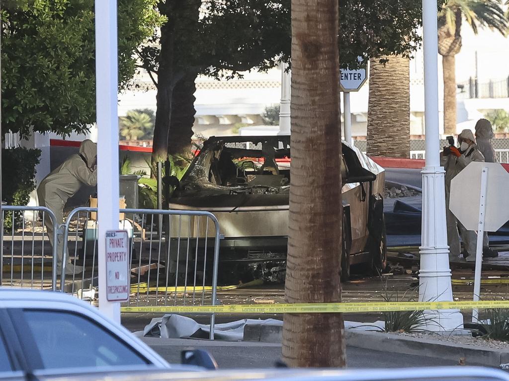 Investigators photograph a Tesla Cybertruck that exploded outside the lobby of President-elect Donald Trump's hotel. Picture: Wade Vandervort/AFP