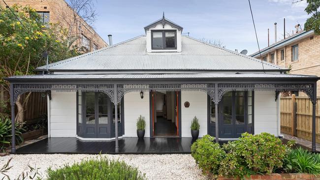 This five-bedroom, two-bathroom Burnett Street residence in St Kilda comes with hydronic heating, reverse cycle cooling, secure alarm, plus an under house wine cellar.