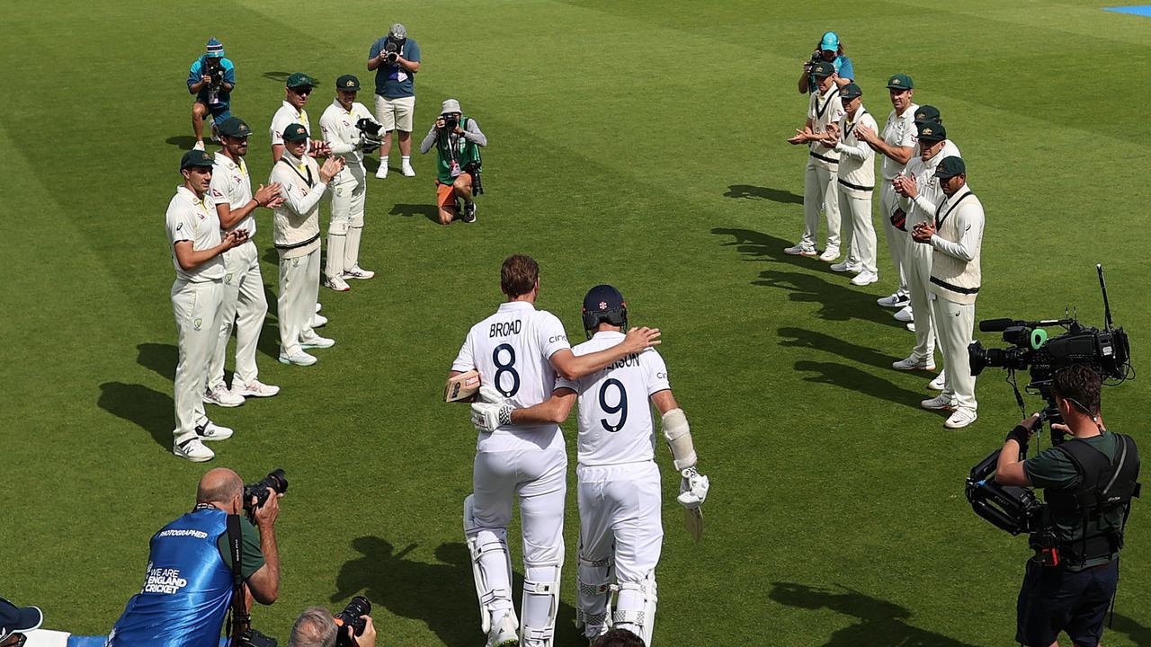 Stuart Broad of England walks out to bat with James Anderson. (Photo by Ryan Pierse/Getty Images)