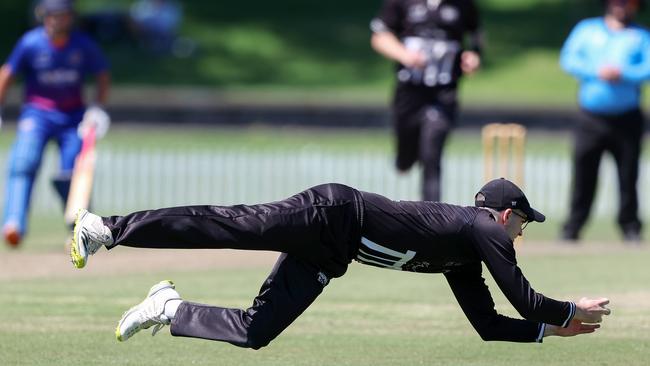 Premier: Camberwell’s Ben Rowles makes a stop in the field. Picture: Georg Sal