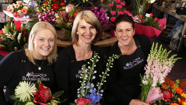 Blooms on Brice: Staff member Rachael Bentley (left) owner Kerri Grassby and Fiona Phillip. Picture: Stuart Milligan