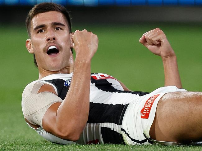 MELBOURNE, AUSTRALIA – MARCH 21: Reef McInnes of the Magpies celebrates a goal during the 2024 AFL Round 02 match between the St Kilda Saints and the Collingwood Magpies at the Melbourne Cricket Ground on March 21, 2024 in Melbourne, Australia. (Photo by Michael Willson/AFL Photos via Getty Images)