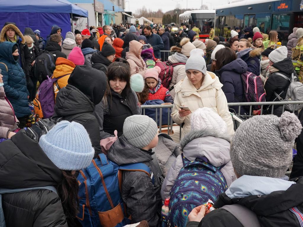 Refugees from Ukraine gather at the distribution centre in Korczowa, Poland. Picture: Janek Skarzynski / AFP