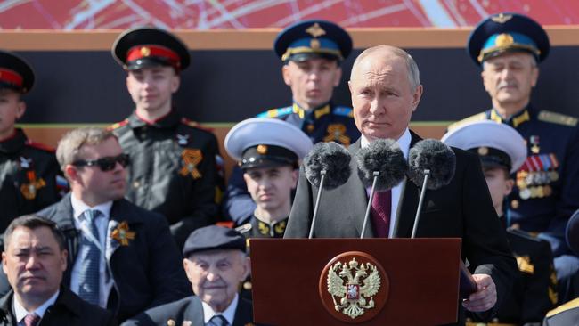 Russian President Vladimir Putin speaks during the Victory Day military parade at Red Square in Moscow on May 9. Picture: SPUTNIK / AFP