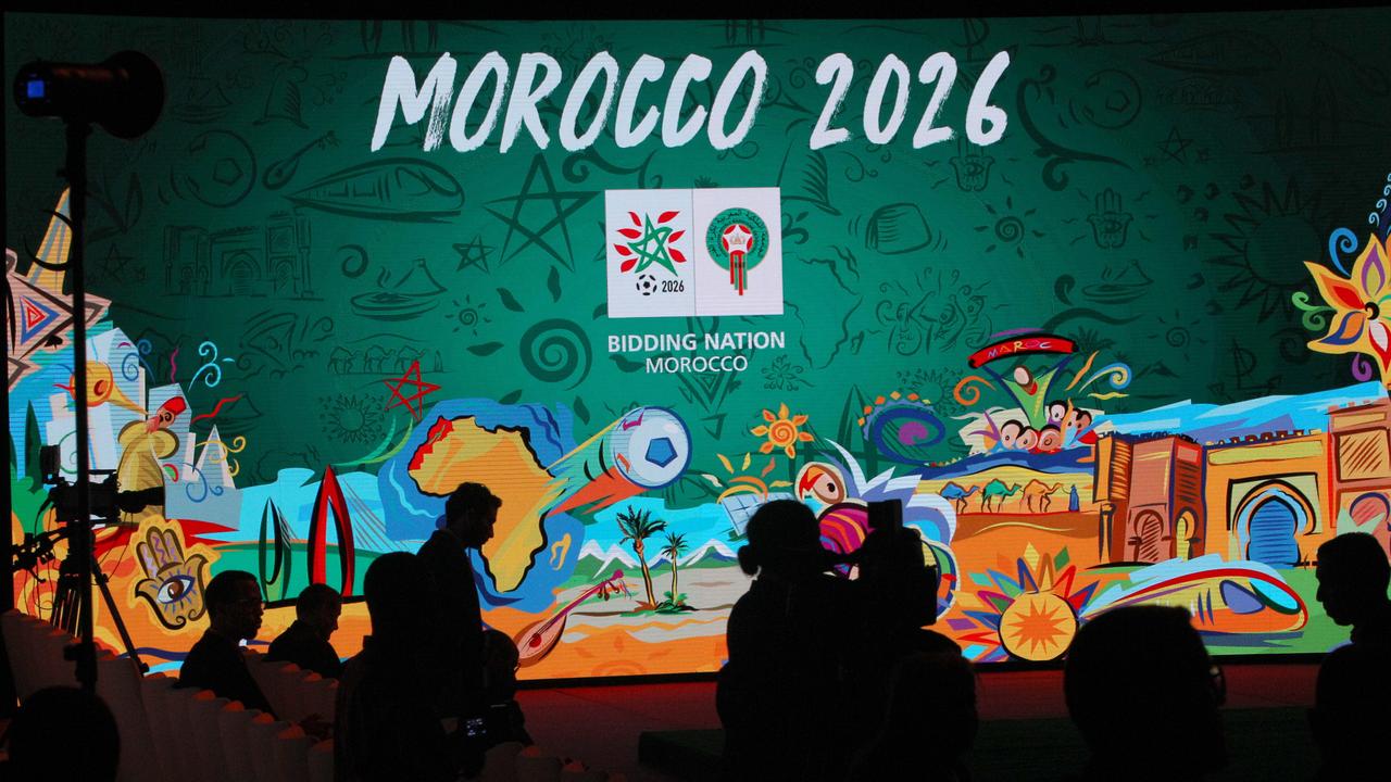 A giant screen displays the logo of Morocco 2026