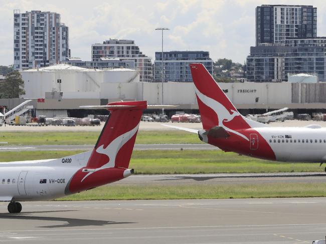 SYDNEY, AUSTRALIA - MARCH 10: Qantas Airways planes are seen at Sydney Airport on March 10, 2020 in Sydney, Australia. Qantas has cut almost a quarter of its international capacity for the next six months as travel demands fall due to fears over COVID-19. The airline today announced it was altering routes to London and would be parking eight of their 12 A380 aircraft. (Photo by Mark Evans/Getty Images)