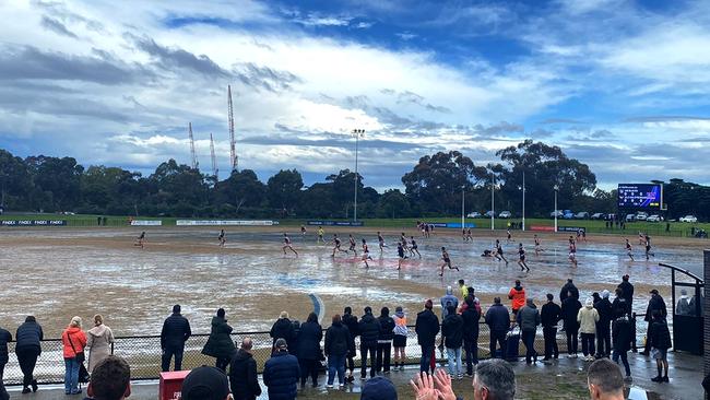 VAFA B-grade grand final, Uni Blacks v Haileybury, smashed by rain this afternoon. (Picture: @UniBlacksFC / Twitter)