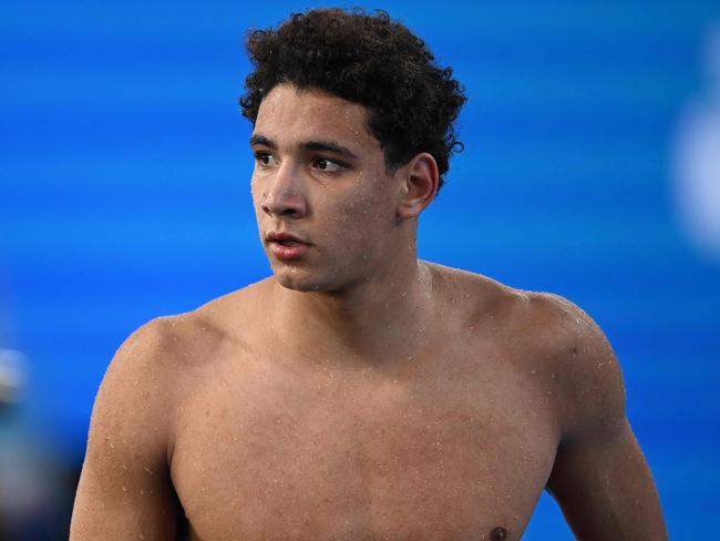 Tunisia's Ahmed Hafnaoui looks on after competing in a heat of the men's 400m freestyle swimming event during the 2024 World Aquatics Championships at Aspire Dome in Doha on February 11, 2024. (Photo by SEBASTIEN BOZON / AFP)