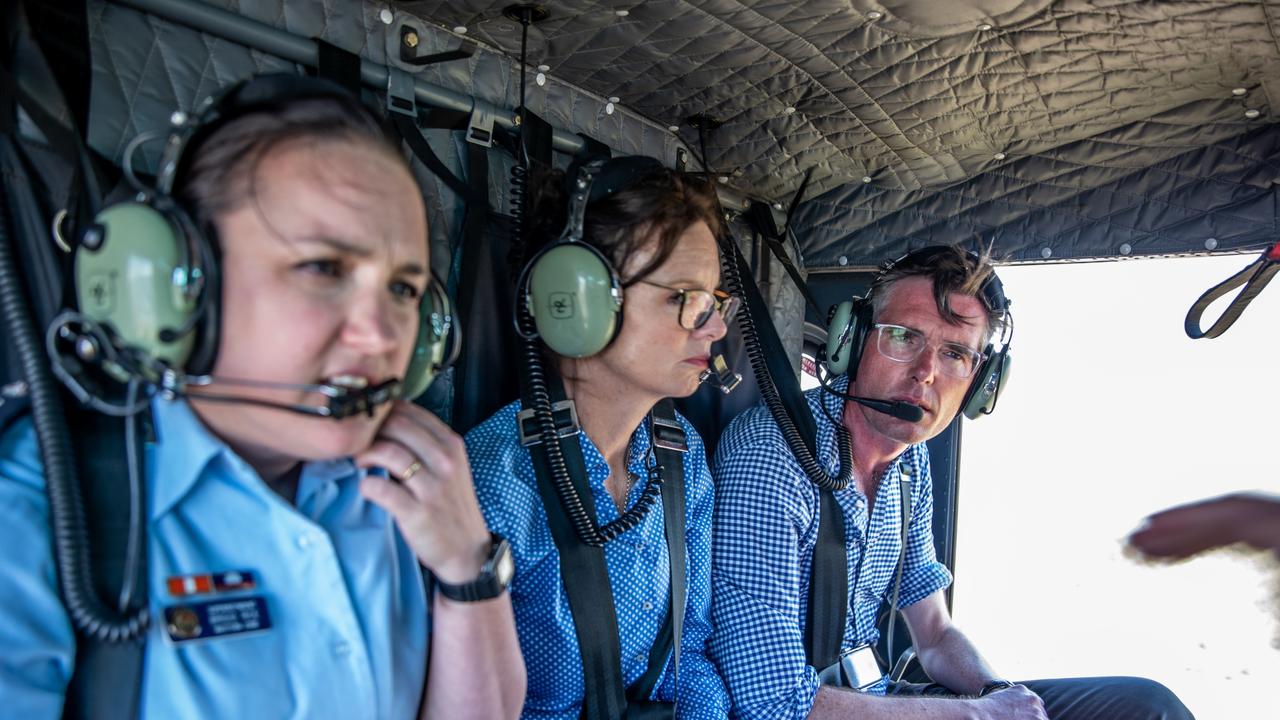 NSW Premier Dominic Perrottet and NSW Minister for Emergency Services and Resilience Steph Cooke inspect flooding during a helicopter flight over the Menindee area in NSW.