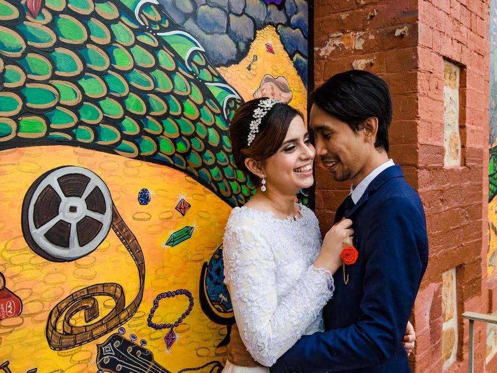 Afeeq Afandi and Azizah Ali, married at Donato Reception Centre, Inspired Eye Photography. Afeeq and Azizah was cancelled twice due to changing restrictions, but after the Woodville cluster lockdown lifted early, the couple sprung into action and organised their wedding on short notice and their family members tuned into a livestream.