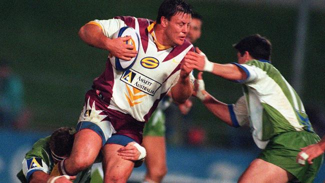 Glenn Lazarus takes a hit-up for the Broncos against Canberra in 1997.