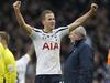 Tottenham Hotspur's English striker Harry Kane (C) celebrates victory after the final whistle during the English Premier League football match between Tottenham Hotspur and Arsenal at White Hart Lane in London, on February 7, 2015. AFP PHOTO / IAN KINGTON RESTRICTED TO EDITORIAL USE. No use with unauthorized audio, video, data, fixture lists, club/league logos or “live” services. Online in-match use limited to 45 images, no video emulation. No use in betting, games or single club/league/player publications.