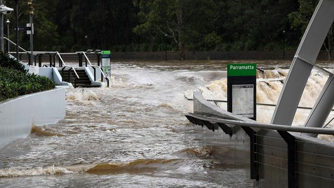 The overflowing Charles St weir yesterday. Picture: Bianca De Marchi