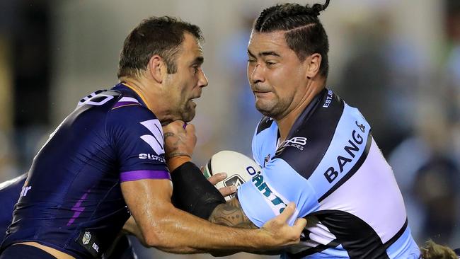 Andrew Fifita charges at Cameron Smith.