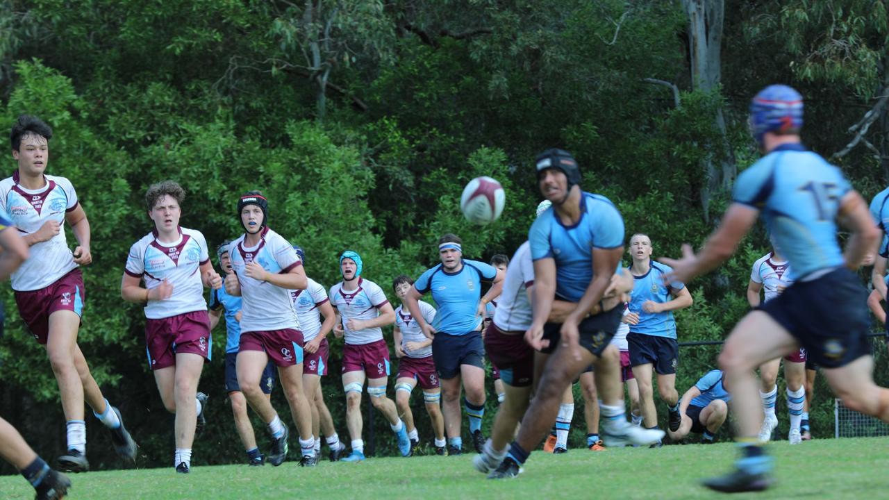 Myron Taupati-Campbell getting crunched in a tackle.