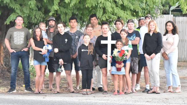 Friends and family of the late Bailey Pini gathered at the scene of the fatal car crash in Bowen to install a memorial at the tree the stolen car collided with. Picture: Kirra Grimes