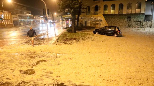 Sea foam whipped up in front of The beach Club at Collaroy blew all the way up to Pittwater Rd. Picture: Damian Shaw