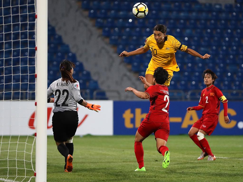 Samantha Kerr heads the ball towards the net in the AFC Women's Asian Cup Group B match between Vietnam and Australia at the Amman International Stadium.