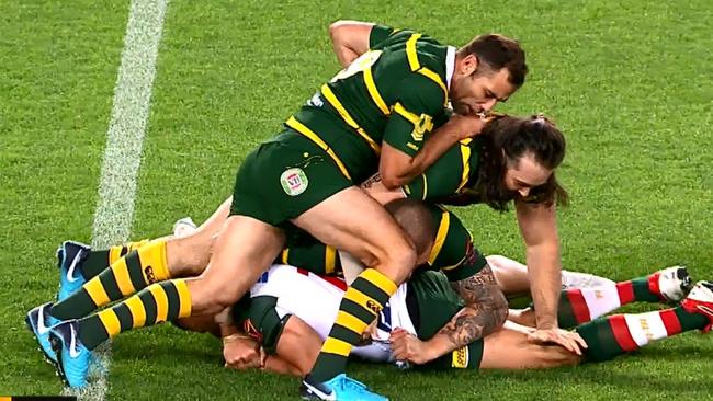 Kangaroos tackling during World Cup.