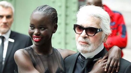 Akech with Karl Lagerfeld.