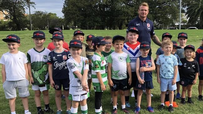 Roosters co-captain Jake Friend was king of the kids at a coaching clinic this week.