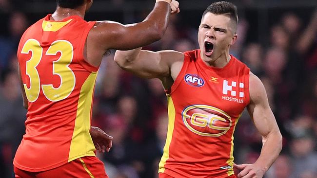 Ben Ainsworth celebrates a goal for the Suns. Picture: AAP Images