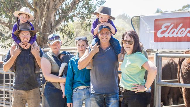 Tania Crisp sold 30 and had the first pen at Omeo on Day Two. Pictured: Brandon Betts with Ava, 4, Zoe Boucher with Riley, 5 months, Tania’s daughter Paige McCoy, Anthony Capobianco with Willow Betts, and Tania Crisp.